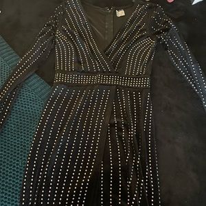 I’m selling a black dress with gems on it